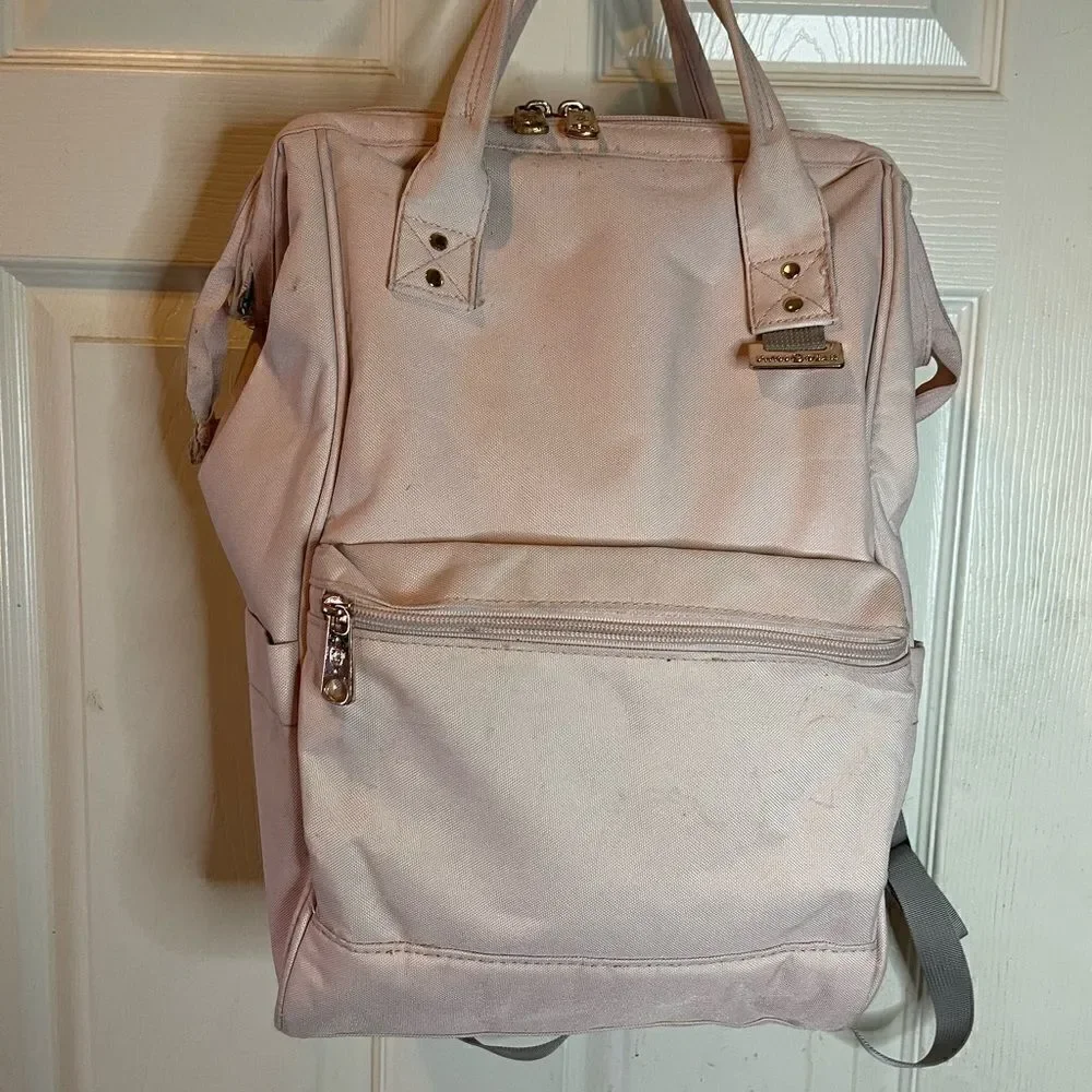 Swiss Gear light pink canvas multi purpose backpack with Rose gold Hardw…